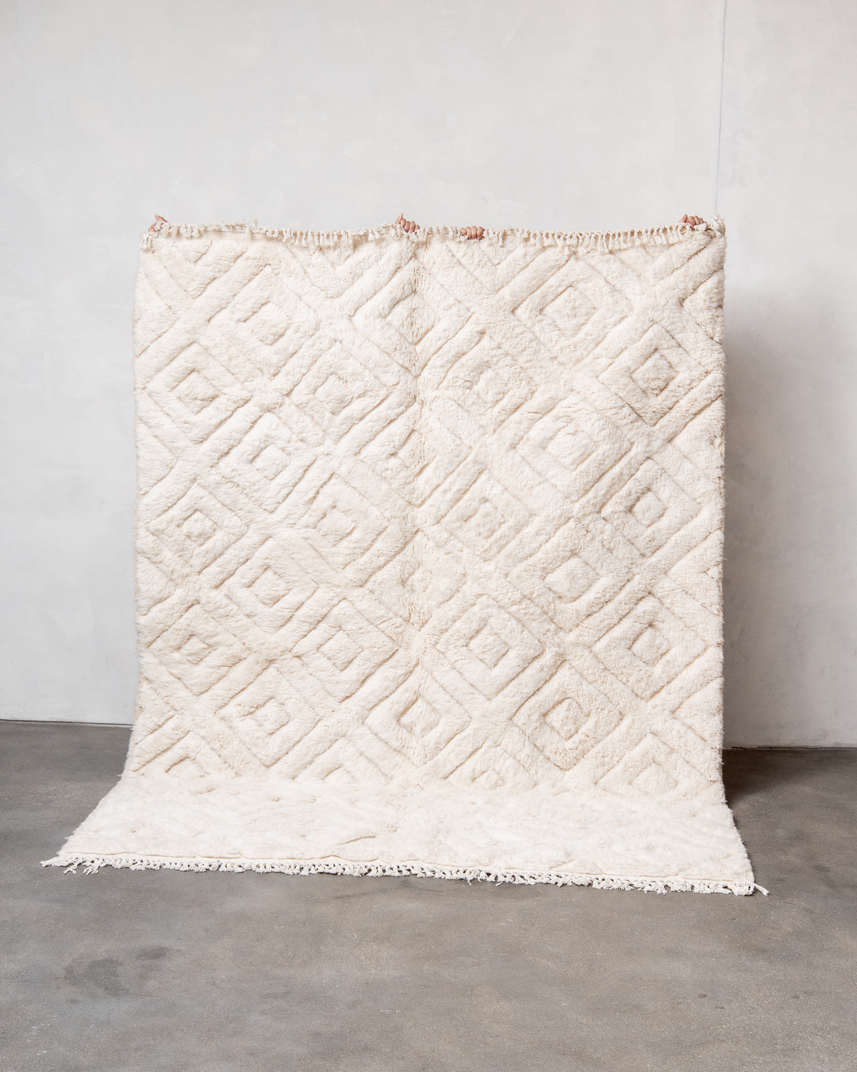Modern, designer, handcrafted Berber rug from Morocco. Beniourain carpet with beautiful colours and patterns and fluffy wool texture.